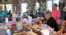 a group of people sitting around a table