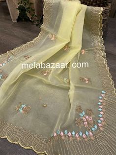 Beautiful light yellow dupatta with gota and embroidery motifs. Yellow Silk Embroidered Fabric For Wedding, Yellow Semi-stitched Chikankari Embroidered Fabric, Yellow Traditional Wear With Gota Work In Tissue Silk, Yellow Dola Silk Dupatta For Eid, Pista Green Traditional Wear With Dupatta In Organza, Pista Green Organza Traditional Wear With Dupatta, Festive Yellow Cutdana Dupatta, Yellow Zari Work Dupatta For Eid, Yellow Bollywood Embroidered Cutdana Fabric