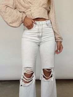 Create a statement with Lane 201's Light Wash Crop Flare Denim! These will be a best seller so add to your cart immediately! These jeans will help achieve that grunge, yet sweet look! Pair with a darker colored top to contrast the colors of the light wash jeans! High Rise Distressing On Knees And Hem Flare Fit 100% Cotton Hand Wash Cold Denim Flare Jeans With Frayed Hem For Fall, Fall Mid-rise Jeans With Frayed Hem, Trendy Fall Flare Jeans With Frayed Hem, Denim Blue Cropped Jeans With Frayed Hem For Fall, Fall Cropped Denim Blue Jeans With Frayed Hem, Fall Denim Blue Bottoms With Frayed Hem, Fall Cropped Distressed Dark Wash Jeans, Trendy Dark Wash Cropped Jeans With Frayed Hem, Faded Distressed Cropped Jeans For Fall