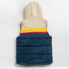 The Epic Fader Puffer Vest is the ultimate fusion of function and fashion. With its vibrant, vintage-inspired exterior and cozy layer of soft micro-flannel on the inside, this retro puffer vest looks as good as it feels. The fill is 100% polyester and the outside fabric is a plush, water-resistant cotton. Additional features are 2 inside pockets and high-quality YKK® Zippers. Get one now and let your retro style shine! Female Model is 5'7" / 125 lbs and is wearing a size XS Male Model is 5'11" / Outdoor Cotton Puffer Jacket With Detachable Hood, Hooded Cotton Puffer Jacket For Cold Weather, Urban Winter Vest For Outdoor Activities, Urban Cotton Hooded Puffer Jacket, Cotton Hooded Puffer Jacket With Double-lined Hood, Urban Cotton Puffer Jacket For Cold Weather, Cotton Puffer Jacket With Double-lined Hood, Winter Cotton Vest For Cold Weather, Cotton Vest For Cold Weather/winter