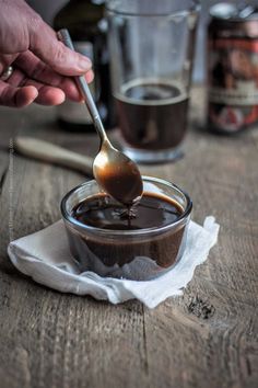 a person is spooning chocolate into a bowl with the words beeramic above it