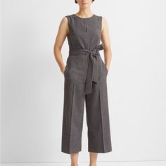 Club Monaco Plaid Jumpsuit Slightly Tapered Leg Concealed Front Zip With Double Hook-And-Bar Closure And Interior Button; Slant Pockets; Center Crease At Front And Back Legs; Five Fabric-Covered Buttons At Outer Ankles; Welt Pockets At The Back Size: 4 Color: Gray & Black 65% Polyester, 33% Viscose, 2% Elastane Lining: 100% Polyester Underarm To Underarm 18” Inseam 23” Waist 28” New With Tags Retail $289 Tailored Sleeveless Spring Pantsuit, Chic Tailored Sleeveless Pantsuit, Tailored Sleeveless Summer Pantsuit, Tailored Sleeveless Pantsuit For Summer, Sleeveless Fitted Pantsuit For Business Casual, Fitted Sleeveless Pantsuit For Business Casual, Sleeveless Fitted Jumpsuits And Rompers For Work, Fitted Sleeveless Jumpsuits For Workwear, Fitted Sleeveless Jumpsuits And Rompers For Work