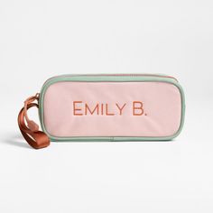 A fun pencil case that's built to handle all the thrills of the day. Colorblocked in candyfloss pink and mint green, the bag has a contrasting tawny brown zipper, zipper pull and loop handle for the perfect finish. Constructed of supremely durable polyester fabric that includes recycled plastic bottles, our roomy, easy-clean case makes it simple to keep all their pens and pencils organized and accessible. Pair with the Colorblock Pink and Mint Green lunch box and matching backpack for a totally Functional Pink Pencil Case For Travel, Trendy Pencil Case With Zipper Closure For Everyday, Everyday Rectangular Pencil Case With Zipper, Trendy Everyday Pencil Case With Zipper, Green Travel Stationery For Back To School, Portable Green Rectangular Stationery, Pink Portable Pencil Case, Pink Pencil Case With Pen Holders, Trendy Rectangular Pencil Case For Everyday