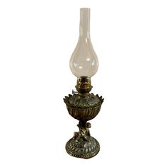 an old fashioned oil lamp on a white background