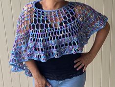 What a great piece. Can be worn more than one way. Great for the late spring or early fall weather. One Size Casual Poncho For Spring, Casual Shawl Poncho For Spring, Oversized Shawl Poncho For Spring, Casual Blue Poncho For Spring, Casual Blue Poncho Cape, Casual Blue Cape Poncho, Fall Beach Cape, One Size Shawl Poncho For Spring, Spring Casual Cape Tops