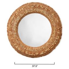 a round mirror with beads hanging from it's sides, and measurements for the frame