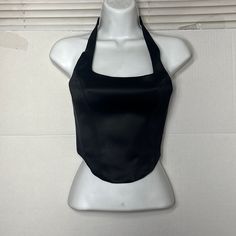 This Is A Lined Halter Top With An Invisible Side Zip And Princess Seams For Shaping. It's Cut From High-Sheen Stretch Satin That's Made With Wood-Based Fibres From Responsibly Managed Forests. Clasp Closure At Back Materials & Care Content: 62% Acetate, 35% Polyamide, 3% Elastane Care: Machine Wash Imported Fit: Tight A Close Fit That Hugs The Body Length: Waist Intended To Hit Between The Waist And High Hip Bust 42 In Waist 35 In Chic Satin Tops For Club, Fitted Black Halter Top For Night Out, Black Halter Neck Top For Evening, Black Stretch Satin Tops, Fitted Solid Color Halter Top For Night Out, Fitted Satin Halter Neck Top, Black Satin Top For Night Out, Fitted Black Halter Neck Top, Fitted Black Halter Top