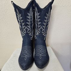 Women's Southern Bell Denim Embroidered Boots By Mata Shoes Nwot Zip On Inside Side Of Both Boots (See Pic For Where Zipper Is Located) Color: Blue With White Embroidery Measurements: Size: 6 1/2 Heel: 1 1/2 Inches Shaft Height From Bottom Of Heel To Top Of Shaft: 13 Inches Shaft Diameter: About 13 1/2 Inches Condition: Nwot. No Stains No Tears #Women #Womensfashion #Boots #Womensboots #Boho #Western Western Denim Boots With Round Toe, Western Denim Boots, Western Boots With Round Toe In Denim Blue, Denim Blue Western Boots With Round Toe, Western Style Denim Blue Boots With Round Toe, Embroidered Boots, White Embroidery, Blue Shoes, Shoes Heels Boots