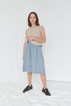 "SIZING & FIT This skirt is loose. Before placing an order, check the approximate measurements of the finished garment given below. Model is 5′6″ (170cm) tall with an 80cm/31″ bust, 68cm/26″ waist, 91cm/35″ hip, and she is wearing an XS in sea green. XS Length ± 65cm | 25.6\" Unstretched waist ± 60cm | 23.6\" Hips ± 130cm | 51.2\" Hem width ± 160cm | 63\" S-M Length ± 65cm | 25.6\" Unstretched waist ± 68cm | 26.8\" Hips ± 138cm | 54.3\" Hem width ± 168cm | 66.1\" L-XL Length ± 65cm | 25.6\" Casual Linen Dress With Tiered Skirt, Summer Linen Dress With Lined Skirt, Summer Linen Dresses With Relaxed Skirt, Blue Relaxed Linen Skirt, Linen A-line Pleated Skirt, Blue Linen Lined Skirt, Blue Linen Flowy Skirt, Linen Dresses With Relaxed Skirt For Spring, Blue Linen Long Skirt