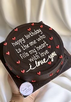 a birthday cake with the words happy birthday to the one who fills my heart with love