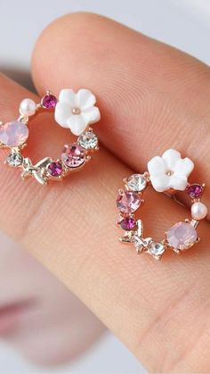 Flaunt your whimsical charm in our Butterfly Pink Multi-Stone Earrings which show off a stunning grouping of CZ stones in shades of pink, a sweet pearl, a gorgeous hibiscus resin flower, and a lovely rose gold butterfly that sits delicately in a circular shape. 

>> Butterfly Pink Multi-Stone Earrings: https://pinealvisionjewelry.com/products/butterfly-pink-multi-stone-rose-gold-earrings Pink Drop Earrings With Butterfly Charm, Pink Butterfly Charm Drop Earrings, Elegant Pink Butterfly Charm Earrings, Pink Sparkling Round Earrings, Elegant Pink Earrings With Butterfly Charm, Pink Sparkling Stone Round Earrings, Pink Round Earrings With Sparkling Stones, Elegant Pink Flower Earrings, Pink Butterfly Charm Earrings As Gift