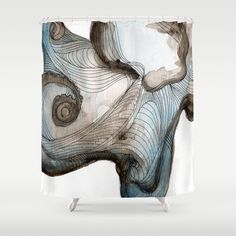 a shower curtain with an abstract design on the front and back of it's head