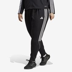 Take your training up a notch in these track pants from Adidas. Built to keep you comfortable and focused during intensive drills.Front Style: Flat FrontClosure Type: DrawstringFit: Regular FitPockets: 2 Side Slip PocketsRise: High RiseFiber Content: 100% Recycled PolyesterLeg Style: Cuffed LegCare: Machine WashCountry of Origin: Imported Adidas High, Plus Size Black, Plus Size Shopping, Drills, Adidas Women, Track Pants, Sweatpants, Track, Adidas