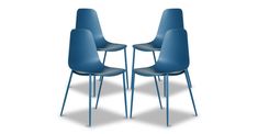 two blue chairs sitting next to each other on top of a white surface with one chair facing the other way