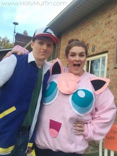 a man and woman dressed up as pokemons in front of a brick house, posing for the camera