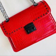 Badgley Mischka Crossbody/Shoulder Chain Red Vegan Leather Studded Embossed Croco Bag New With Tag Approx Measurement; Height: 7” Length: 9.80” Width: 3.25” Trendy Red Shoulder Bag With Chain Strap, Luxury Red Bag With Chain Detail, Red Evening Shoulder Bag With Chain Strap, Chic Red Shoulder Bag With Chain Strap, Red Evening Bag With Chain, Elegant Red Shoulder Bag With Chain Strap, Red Chain Shoulder Bag Rectangular, Shoulder Chain, Badgley Mischka