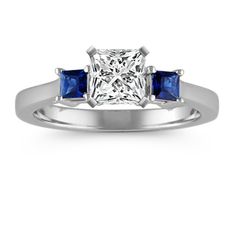 a princess cut diamond and blue sapphire engagement ring