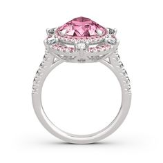 With grace and shimmer, this sparkling ring is a classic style that complements her sophisticated taste. Crafted in sterling silver, it features a brilliant pink stone wrapped in double halo frames of pink and white stones,bringing out its beauty and sparkle. Glamorous and classic, this exceptional ring will forever express your eternal love and undying commitment.Carat Weight: 6.05 ctStone Size: 9*13 mmStone Type: Jeulia® StoneNumber of Stones: 1 Stone Color: Fancy PinkStone Shape: PearCarat Weight: 2.051 ctStone Size: 2.5,1.7,1.3,1 mmStone Type: Jeulia® StoneNumber of Stones: 76 Stone Color: Diamond White, Fancy PinkStone Shape: RoundWeight: 6.84 gWidth: 22.55 mmHeight: 7.7 mmThickness: 2.95 mmMaterial: 925 SilverPlating Color: Silver Pink Cluster Diamond Ring Fine Jewelry, Pink Cluster Diamond Ring With Center Stone, Pink Cluster Diamond Ring, Formal Pink Sapphire Diamond Ring With Halo Setting, Pink Cluster Jewelry With Diamond Accents, Pink Sapphire Cluster Ring Fine Jewelry, Fine Jewelry Pink Cluster Ring With Accent Stones, Pink Cluster Rings With Brilliant Cut, Pink Formal Cluster Ring With Prong Setting