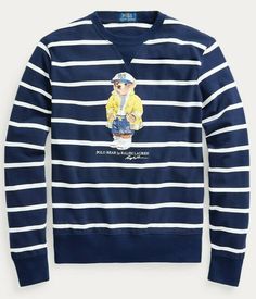 a blue and white striped sweater with a cartoon character on it