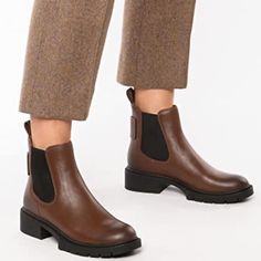 A Subtle Lug Sole Adds Utilitarian Charm To These Classic Leather Chelsea Boots. Leather Upper Round Toe Pull-On Style Elasticized Sides Heel Tab Man-Made Lining Rubber Sole Imported Block Heel, 0.75" (20mm) Shaft, 4.75" Leg Opening, 9.75" New Without Box With Store Markings At The Bottom. Faux Leather Chelsea Boots For Work, Fall Chelsea Boots With Removable Insole, Flat Heel Boots With Leather Footbed For Work, Fall Chelsea Boots With Cushioned Footbed And Round Toe, Flat Heel Chelsea Boots With Rubber Sole For Work, Chelsea Boots With Leather Footbed For Work, Closed Toe Textured Sole Work Boots, Workwear Boots With Textured Sole And Closed Toe, Workwear Boots With Textured Sole