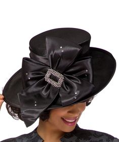 Giovanna Deluxe Church Hat Style: HG1103 Color: Black Elegant bow adorned hat featuring stone embellishment. Crown Circumference: 23"