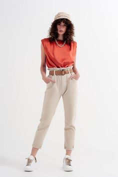 Beige-colored pants are trending strong this season. These jeans boast of a paper bag waist that is very elastic, stretchy, and figure-flattering. The medium-weight fabric is breathable and soft for the spring and summer months.   The side and back pockets are utility, as are the belt loops.  Pleats in front are figure enhancing because they draw attention to your waistline. The paper-bag waist crosses your torso at its narrowest part, completing the complimentary aesthetic. Also available in li Jean Mom, Mens Lightweight Jacket, Men Parka, Types Of Jeans, Dressy Sandals, High Waisted Mom Jeans, Jeans Mom, Print Kimonos, Mom Jean