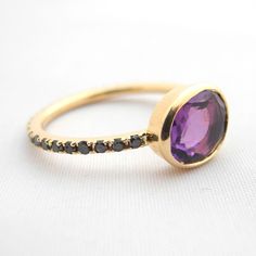 amethyst Luxury Purple Ring With Bezel Setting, Luxury Amethyst Rings With Rose Cut Diamonds, Luxury Yellow Gold Amethyst Ring With Rose Cut Diamonds, Modern Amethyst Diamond Ring, Round Amethyst Ring With Rose Cut Diamonds, Modern Diamond Amethyst Ring, Purple Diamond Ring With Rose Cut For Gift, Elegant Amethyst Ring With Rose Cut Diamonds, Purple Rose Cut Diamond Rings In 14k Gold