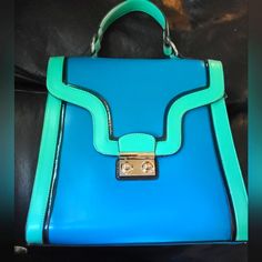 This Is A Beautiful Structured New Ocean Teal Via Bag By Vieta. This Bag Has Room For Everything You Need And Then Some! This Beauty Comes With Along Shoulder Strap As Well As The Chic Smaller Handle. It Has More Pockets Inside Than You'll Ever Need. I'm Uncertain If This Is Genuine Leather Or Vegan. It Feels And Smells Like Genuine Leather. The Measurements Are 9x9x3.5. Please Ask Questions And Make An Offer. I Can't Say Yes If You Don't Ask! Lavender Purse, Teal Handbag, Mermaid Backpack, Gucci Crossbody Bag, Brown Crossbody Bag, Gucci Crossbody, Straw Handbags, Fashion Tote Bag, Brown Crossbody