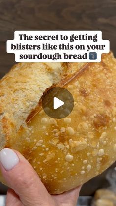 a person holding a piece of bread in their hand with the caption'the secret to getting blisters like this on your sourdough bread '