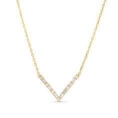 Our Alternating Round and Baguette Diamond V-Shaped Pendant, graced with a total of 0.27 carats. This pendant's unique V shape design is elegantly simple, harmonizing the brilliance of round and baguette diamonds. Yellow Gold Diamond Necklace With Baguette Cut Diamonds, Elegant Baguette Diamond Necklace In Yellow Gold, Elegant Yellow Gold Baguette Diamond Necklace, Elegant Baguette Yellow Gold Diamond Necklace, Formal Baguette Diamond Necklace, Formal Diamond Baguette Necklace, Baguette Cut Diamond Necklace, Diamonds Direct, Baguette Diamonds