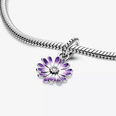 Absolutely gorgeous, high quality 925 sterling silver, daisy dangle charm with enamel that graduates in color from the center to the edge of each petal. A sparkling cubic zirconia crystal lays in the center. Makes a lovely addition to your charm bracelet or as a gift for someone special. You can also place this charm on a chain for a simple, yet stunning necklace. This charm will fit all top brand charm bracelets including brands such as Pandora and Chamilia. It will also fit 3mm European snake Purple Jewelry With Flower Charm For Mother's Day, Sterling Silver Flower Charm, Sterling Silver Jewelry With Purple Flower Charm, Purple Sterling Silver Jewelry With Flower Charm, Sterling Silver Charms Jewelry In Flower Shape, Sterling Silver Flower Charms Jewelry, Purple Daisy, Turtle Charm, Pandora Bracelet Charms