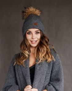 All our knitted hats are with 100% cotton lining so it's perfect for chilly spring weather. Wind resistant and the head is not sweating. Because of the lining hats don't stretch and keep its shape. Fur pom color can be a bit different because fur is natural and not colored. Material: 70% Merino wool, 30% alpaca wool Lining: 100% cotton Pom pom: Natural fur Colors available: Ivory, Black, White, Dark grey, Light grey, Dark blue, Red Sizes available: S 22 inches , 56/58 cm , M 23 inches, 58/60 cm Weather Wind, Wool Knitted Dress, Wool Berets, Hat Handmade, Grey Knit Sweater, Wool Turtleneck, Knit Turtleneck Sweater, Slouchy Hat, Handmade Hat