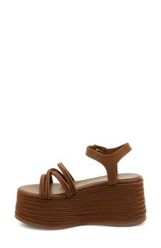 Espadrille-inspired braiding highlights the lofty platform sole of this bold, retro sandal. 3 1/4" heel; 2 3/4" platform Textile and leather upper/synthetic lining/rubber sole Imported Leather Chunky Platform Sandals For Beach, Brown Synthetic Platform Sandals, Synthetic Sandals With Braided Ankle Straps, Synthetic Open Toe Wedge Sandals With Braided Straps, Synthetic Braided Strap Open Toe Wedge Sandals, Synthetic Sandals With Woven Leather And Round Toe, Leather Wedge Sandals With Braided Straps For Beach, Leather Wedge Sandals With Braided Straps For Vacation, Synthetic Wedge Sandals With Braided Straps