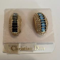 Christian Dior Vintage Clip On Earrings Blue Crystal Rhinestone Gold Tone Auth ** Unique One Of A Kind Piece Authentic Christian Dior Earring Signed A Clip On Cd Earring With Blue & White Stones. Gold Tone Rare, 1980’s? Won’t Tarnish High Quality Material No Box Only Earring Made In Germany Blue Diamond-accented Evening Earrings, Designer Blue Jewelry For Anniversary, Luxury Blue Earrings For Party, Formal Jeweled Blue Earrings, Luxury Blue Earrings For Evening Wear, Luxury Blue Earrings For Evening, Elegant Blue Rhinestone Earrings, Luxury Blue Party Earrings, Elegant Blue Jeweled Earrings