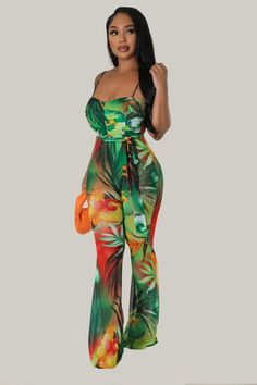 Experience the essence of tropical paradise with our Bella Tropical Print Sexy Jumpsuit. This alluring stretch jumpsuit features a unique stunning print and spaghetti straps that take hotness to the next level. The square neckline and sleeveless design showcase your shoulders and create a flattering silhouette. The sheer fabric adds an extra touch of allure, while the ruched details and self-tie waist accentuate your curves. With no closure, it offers easy and comfortable wear. Perfect for a bea Stretch Jumpsuit, Beach Getaways, Sheer Fabric, Square Necklines, Tropical Paradise, Sheer Fabrics, Showcase Design, S Pic, Tropical Print