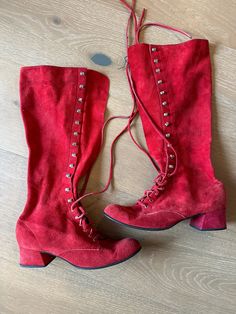 These are a pair of vintage suede Gogo boots from the 60s 70s. They are made by Palma nova in Spain. They are a tomato red/ orange color and the suede is very soft. Lace up suede laces are intact. Shoes are in great overall vintage condition. No obvious stains, marks or holes. Smoke free home. Size 6.5 16" tall 1.5" heel at tallest point 9 3/4" from toe to heel Vintage Gogo Boots, Red Lace Up Boots, Vintage Suede Boots For Fall, Vintage Red Winter Boots, Vintage Red Boots For Fall, Retro Suede Boots For Fall, Fitted Red Vintage Boots, Palma Nova, 60s Boots