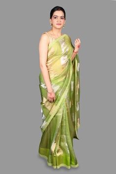 Pista green, silver and gold saree crafted in pure organza silk with broad zari striped pattern and bloom border detailing. Comes with an unstitched blouse piece. - Aza Fashions Party Green Dupatta With Zari Weaving, Green Pre-draped Saree With Self Design In Tissue Silk, Green Tissue Silk Pre-draped Saree With Self Design, Green Saree With Zari Weaving For Party, Green Self Design Tissue Silk Pre-draped Saree, Luxury Pista Green Organza Pre-draped Saree, Semi-stitched Pista Green Art Silk Saree, Pista Green Organza Pre-draped Saree, Green Bollywood Organza Saree