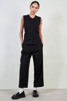 - Fit: True to size- Materials: 65% polyster, 35% rayon- Thickness: Moderate- Sheerness: None- Stretch: None- Lining: None- Care: Dry clean or hand wash cold and dry in shade Tomboy Wedding Outfit, Elegant Pants Suits, Black And White Suit, Black Waistcoat, Corporate Fashion, Tailored Suit, Office Wear Women, Corporate Wear, Suit Waistcoat