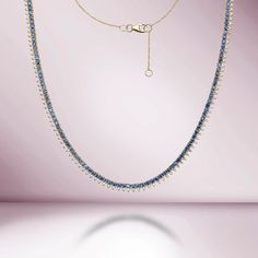 Handmade in New York of polished 14k white gold, CAPUCELLI's Tennis necklace showcases a delicate box chain embellished with dozens of shimmering white diamonds.Beautiful Diamond Tennis Necklace. A staple in your jewelry collection. Handmade in New York City of polished 14k white gold. This tennis necklace showcases a Tennis Choker Necklace, Style Theory, Diamond Tennis Necklace, Chocker Necklace, Round Sapphire, Blue Sapphire Diamond, White Gold Necklaces, Tennis Necklace, Natural Earth