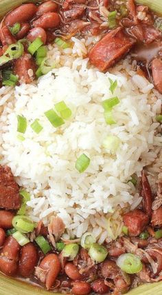 a green bowl filled with rice and beans