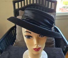 Vintage black 100% wool ladies had has a ruched satin band and a rolled brim. In excellent vintage condition, there is a hat pin with a large crystal through the band. There is no size listed but the head opening is 7 1/4". What a wonderful elegant statement! And the shipping is included. Vintage Wide Brim Felt Hat For Evening, Vintage Winter Fedora For Party, Adjustable Cloche Felt Hat For Evening, Adjustable Brimmed Felt Hat For Evening, Vintage Winter Party Fedora, Vintage Curved Brim Felt Hat For Evening, Vintage Felt Hat With Curved Brim For Evening, Classic Evening Felt Hat For Kentucky Derby, Vintage Fitted Felt Hat For Evening