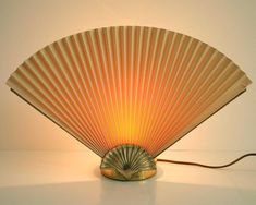 a lamp that is shaped like a fan