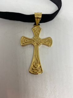 vintage Celtic golden Stainless Steel Cross pendant necklace Very solid Gothic cross Vintage design Silver stainless steel About 1.5 inches Hangs on a velvet ribbon, Can be worn on a chain. All jewelry is shipped in a nice gift box. Check out our over a THOUSAND great reviews Stainless Steel Cross Pendant, Gothic Cross, Gothic Crosses, Steel Cross, Cross Pendant Necklace, Design Silver, Velvet Ribbon, Vintage Necklace, Cross Pendant