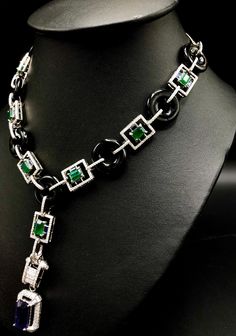 "So Perfect Jewelry Boutique proudly presents \"The Ultimate-Art-Deco Emerald & Sapphires Necklace\". Extremely stunning with TOP VIVID GREEN, ZAMBIAN EMERALDS! 100%. GUARANTEE!! CERTIFIED! With over 524 HANDSET, natural E/VS diamonds! Set in handcrafted 18K solid white gold setting. A DREAM COMES TRUE! Gorgeous masterpiece! Ultimate ART-DECO Style Necklace! Featuring an ENORMOUS & extra rare UNHEATED, 12.99 carats, color change sapphire, 7 pieces of VIVID GREEN, Zambian emerald weightin Gold Necklace Pendant, Color Change Sapphire, Emerald Blue, White Gold Necklace, Jewelry Boutique, Zambian Emerald, Vs Diamond, White Gold Necklaces, Sapphire Necklace