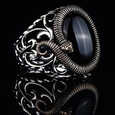 Silver Onyx Ring , Silver Snake Model Ring , Silver Serpent Ring , Men Gothic Design Snake Ring , 925k Sterling Silver Ring , Gift For Him ★Item Details * Gender : Male / Female * Material : 925K Sterling Silver * Total weight : 12 Grams * Gemstone : Onyx Stone ✔ Ready to Ship in 1-2 Business Days .. ✔ Shipped to the Worldwide 1-5 business days with free shipping... ✔ The product will be sent to you with a handmade wooden box to avoid any damage during shipping... ✔ Visit our store, browse other Armor Rings, Emerald Stone Rings, Serpent Ring, Gothic Design, Snake Jewelry, Ring Men, Snake Ring, Citrine Stone, Onyx Ring