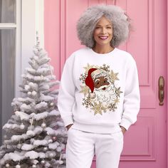 Black Santa Claus Christmas Sweatshirt, Vintage African American Santa Shirt, Retro Christmas Shirt, Diverse Holiday Apparel A sturdy and warm sweatshirt bound to keep you warm in the colder months. A pre-shrunk, classic fit sweater that's made with air-jet spun yarn for a soft feel and reduced pilling. * 50% cotton, 50% polyester * Pre-shrunk * Classic fit * Air-jet spun yarn with a soft feel and reduced pilling * Double-needle stitched collar, shoulders, armholes, cuffs, and hem For Matching Tote Bag and other unique items please visit our shop https://www.etsy.com/listing/1605836553/black-santa-claus-christmas-tote-bag?ref=listings_manager_grid This product is made especially for you as soon as you place an order, which is why it takes us a bit longer to deliver it to you. Making produc Black Santa Claus, African American Christmas, Retro Christmas Shirt, American Christmas, Christmas Tote Bags, Santa Shirt, Holiday Apparel, Christmas Tote, Black Santa