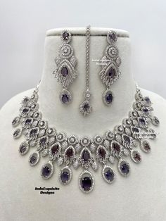 American Diamond Necklace Set/CZ Necklace/ Reception Jewelry/Statement Necklace Set/silver Jamini Purple  All items are shipped from Brampton, Ontario, Canada. If you need your item by a certain day, please reach out to us for express delivery option before placing the order so that we can update the shipping for you. Standard shipping/delivery timeline Below are the delivery timeline estimates once the order is shipped. ---> USA delivery timeline * 3-6 business days to major urban centers in US Purple Diamond Necklaces For Wedding, Purple Diamond Necklace For Wedding, Purple Diamond Wedding Necklace, Elegant Purple Diamond Necklace, Purple Sparkling Stone Necklaces For Wedding, Purple Sparkling Stones Necklace For Wedding, Purple Cubic Zirconia Necklaces For Anniversary, Purple Cubic Zirconia Necklace For Anniversary, Purple Diamond Round Necklace