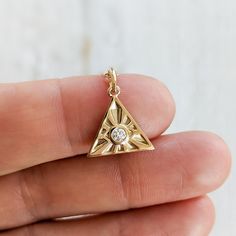 This solid gold diamond Eye of Providence (All Seeing Eye) pendant necklace is the perfect addition to your Egyptian history & culture jewelry collection. It's beautiful and just one of the many spiritual symbols we have available in our shop. Available in 14k and 18k yellow rose and white gold, as well as platinum--just choose your desired metal from the drop-down menu! Details: - Made to order in New York City, USA - Solid 14k, 18k gold or platinum - choose desired metal from drop-down men Gift Diamond-shaped Necklace With Single Diamond, Stamped 14k Diamond Fine Jewelry, Diamond Pendant Charm Necklace, Gold Charm Necklace With Single Diamond Fine Jewelry, Gold Fine Jewelry Charm Necklace With Diamond, Gold Charm Necklace With Single Diamond, Gold Charm Necklaces With Single Diamond, Yellow Gold Cubic Zirconia Pendant Charm Necklace, Symbolic Recycled Gold Pendant Jewelry