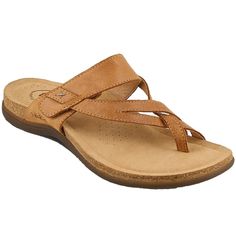 This truly is the Perfect sandal for any time any where! Premium leather toe loop thong sandal with strappy upper design and adjustable hook and loop strap closure. Lightweight cork-latex midsoles are topped with soft padding and lined in luxurious suede, offering exceptional arch and metatarsal support. Outsoles are flexible, durable rubber.FeaturesArch & metatarsal supportSuede Stylish Flip Flops, European Shoes, Perfect Tan, Tan Sandals, Leather Thong Sandals, Leather Sandals Women, Taos, Retail Therapy, Rubber Heels