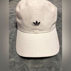 White Adidas Basketball Cap Adidas Cotton Summer Hats, Adidas Cotton Hats For Summer, Adidas Cotton Snapback Baseball Cap, Adidas Casual Curved Brim Hat, Adidas Casual Summer Hats, Adidas Casual Hat With Curved Brim, Casual Adidas Hat With Curved Brim, White Cotton Hats For Streetwear, White Adjustable Dad Hat With Curved Bill